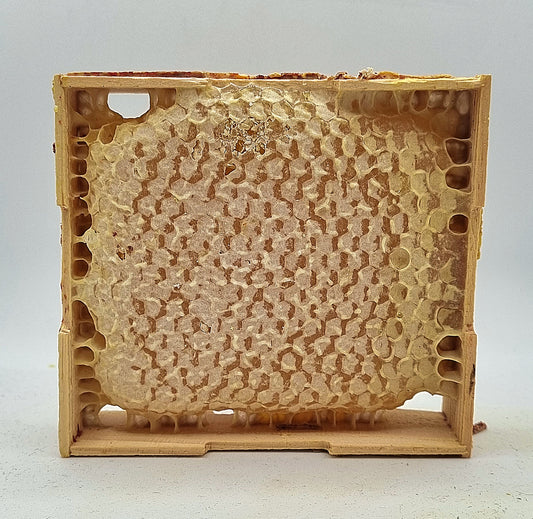 wildflower honeycomb in wooden frame