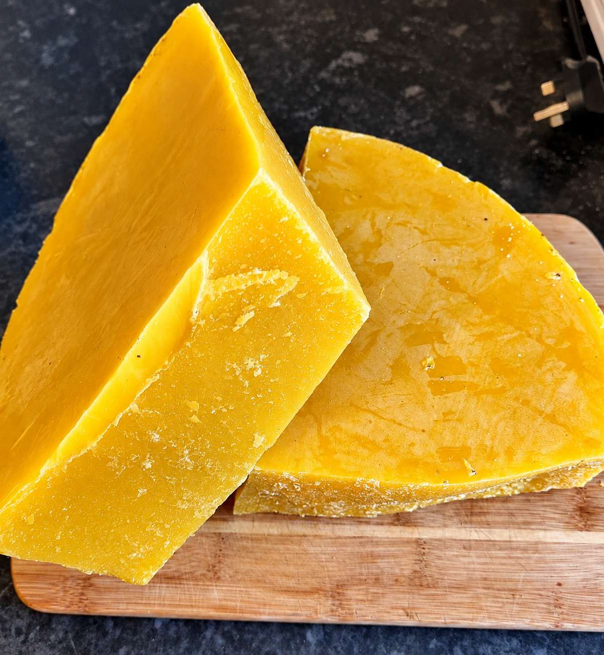 Natural pure beeswax blocks showing golden colour and texture