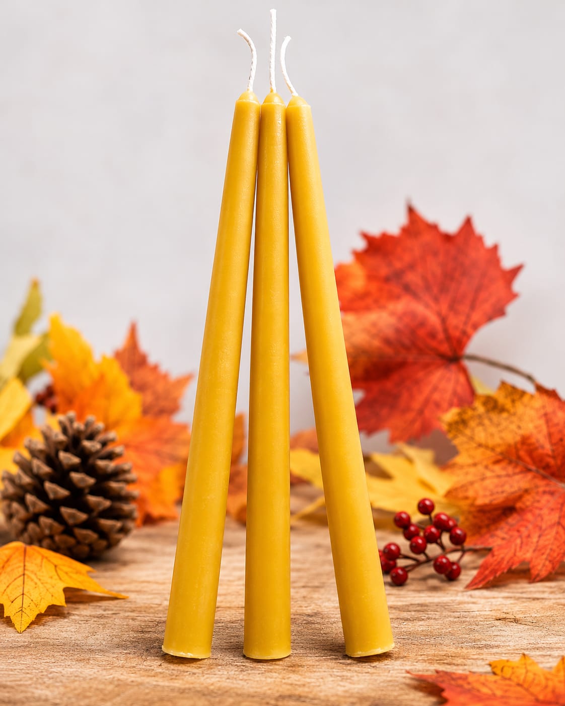 100% pure beeswax taper dinner candles, 26cm long, in a natural golden colour