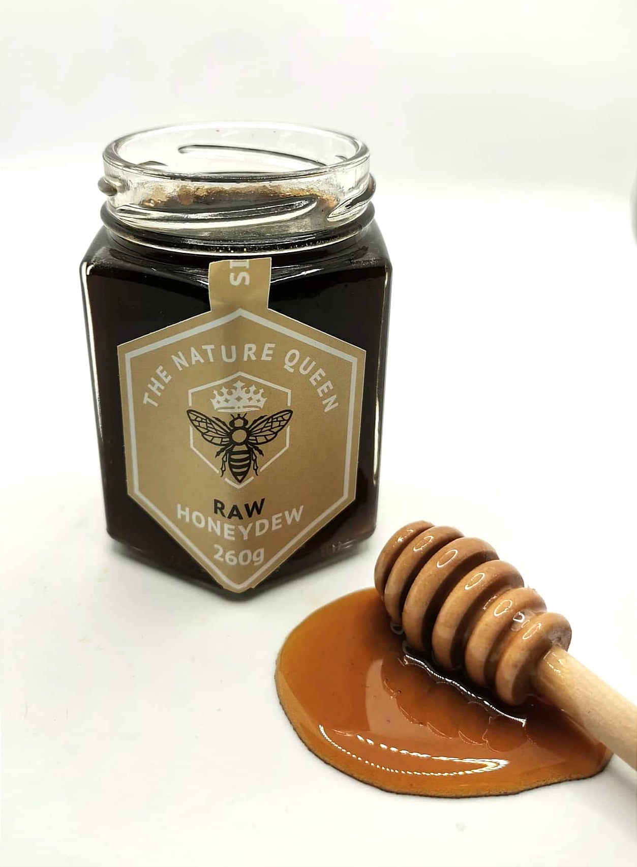 honeydew honey on wooden spoon